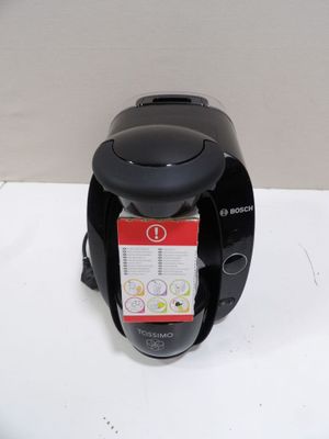 a coffee maker that is sitting on a table