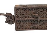 a small wooden box with a gun on top of it