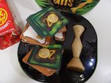 a plate of cookies and a bag of chips on the table