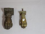 pair of antique brass hand door knockets