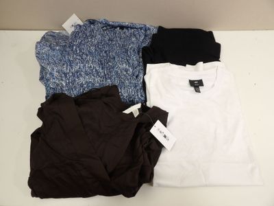 three t - shirts are sitting on a table with a price tag