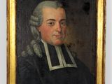 portrait d'un homme vêtu d'un manteau noir à col blanc