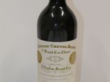 a bottle of wine that is sitting on a table