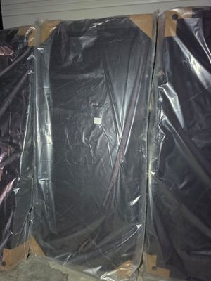 two pieces of plastic wrapped up on top of each other