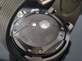 a close up of a watch on a table