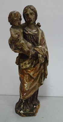 an image of a statue of a woman holding a child