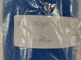 the blue tie is wrapped in plastic and ready to be worn