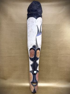 an image of a wooden stick with a bird on it