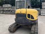 an image of a construction vehicle parked in a lot