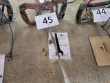 a lot of tools that are sitting on the ground