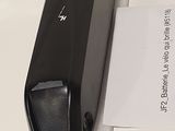 an image of a cell phone sitting on top of a desk