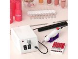 an image of a nail dryer and tools on a table