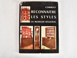 a book with pictures of a room and a clock on the wall
