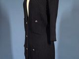 a black dress and jacket on a mannequin mannequin mannequin mannequin mannequin mannequin mannequin mannequin mann