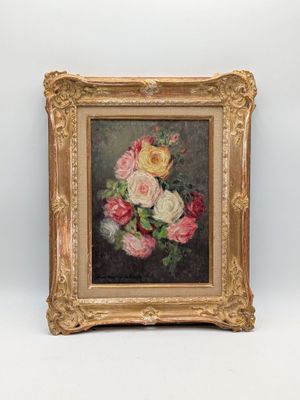 tableau représentant un bouquet de fleurs dans un cadre doré sur fond blanc