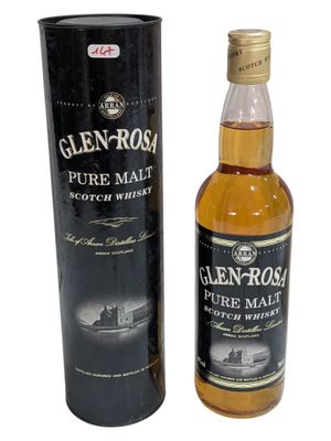 a bottle of glen ross pure malt whisky next to a black box