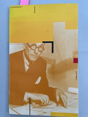 a book with a picture of a man sitting at a desk