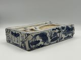 a blue and white box with a picture of animals on it