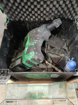 a tool in a box that is sitting on the floor