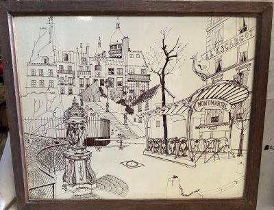 une photo représentant un dessin illustrant une scène de rue, placée dans un cadre