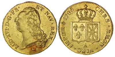 une pièce souveraine en or surmontée d'une couronne