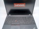 a laptop that has a lenovo logo on the screen
