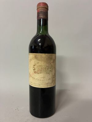 a bottle of wine that is sitting on a table