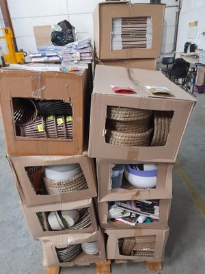 boxes stacked on top of each other in a warehouse