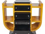 an image of a black and yellow desk with drawers
