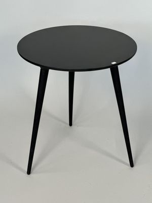 une table noire à deux pieds avec un plateau noir