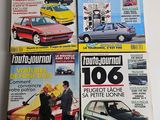 four magazines of different cars on display on a table