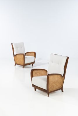 pair of art deco lounge chairs in the manner of person