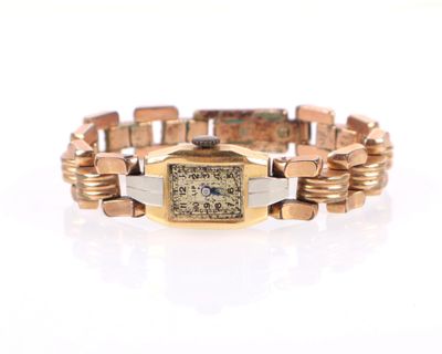 une image représentant une montre-bracelet en or et en argent au cadran carré