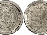 a close up of a coin on a white background