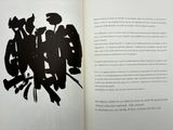 an open book with a picture of a group of people