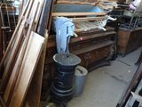 several pieces of wood are stacked on top of each other in a room