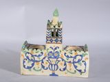 a picture of a ceramic figurine of a church