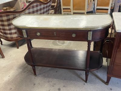 Console demi-lune en acajou ouvrant par un tiroir principal …