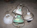 three lamps that are sitting on the ground next to each other
