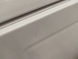a close up of a washer and a dryer in a room