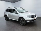 the white dacia is parked in a large white room