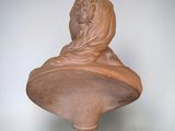 sculpture of a bust of a woman on a pedestal