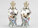 pair of chinese vases with roosters and flowers painted on them