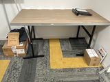 an image of a desk in a small room