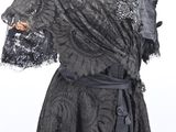 an image of a woman ' s black dress on a mannequin