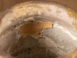 a close up view of the inside of a glass jar