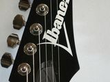a guitar that is sitting on top of a table