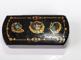 a small black box with a cat design on it