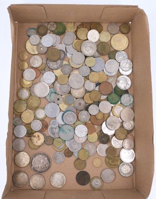 a box full of coins sitting on a table