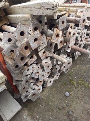 a large pile of metal and wood on the ground